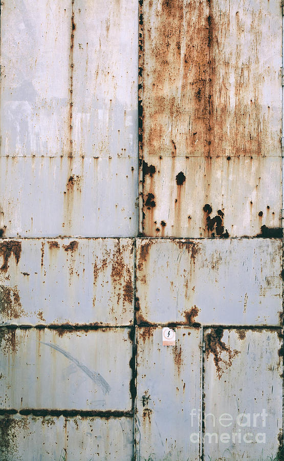 Old grunge metal rusty doors. Photograph by Michal Bednarek