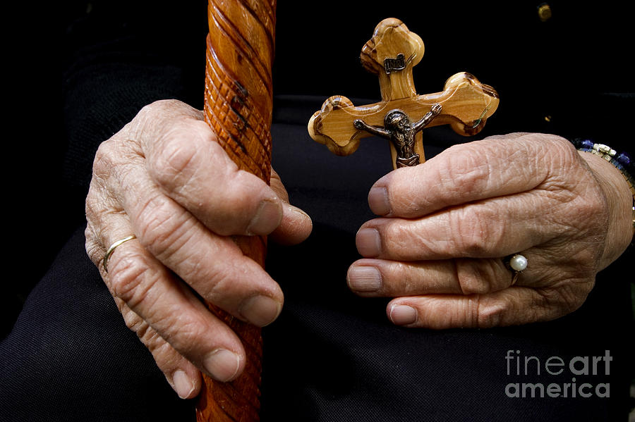 Old Hands and crucifix  Photograph by Danny Yanai