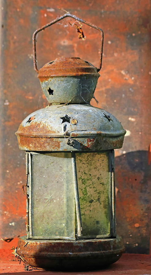 Old Lantern And Roof Tile Photograph by Jeff Townsend