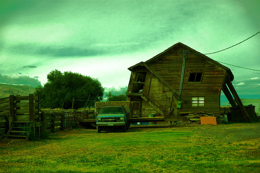 Old leaning barn and pick-up Photograph by Jeff Swan