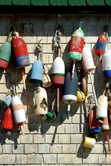 Maine Photograph - Old lobster buoys by David Campione