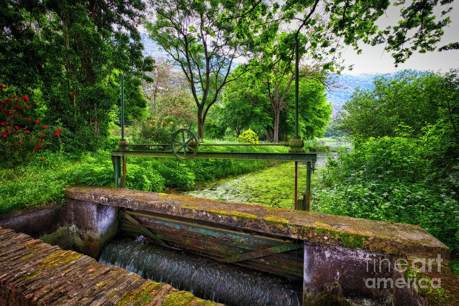 Old Lock on the Ninfa Creek Photograph by George Oze
