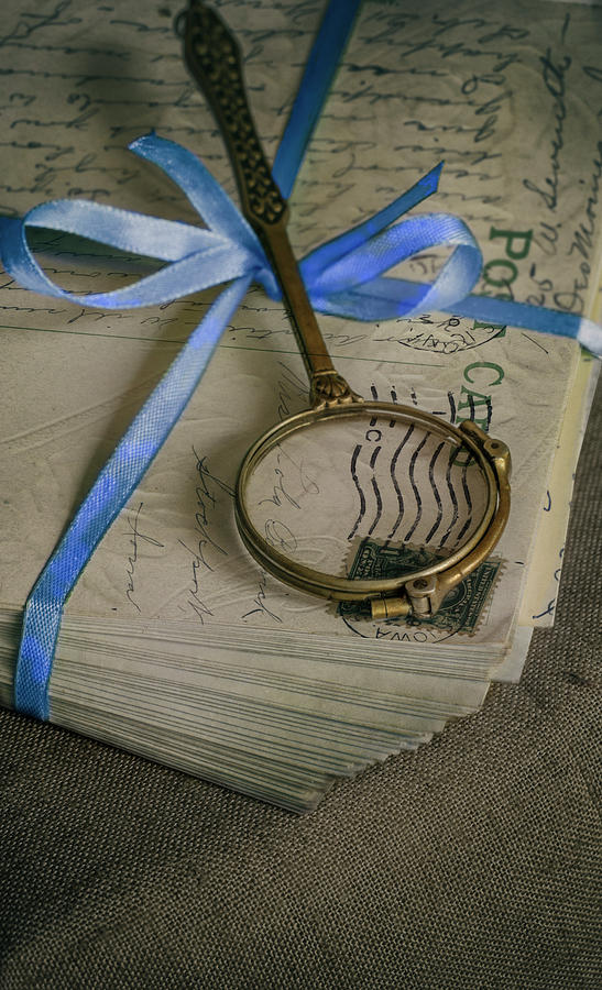 Old loupe and pile of vintage letters Photograph by Jaroslaw Blaminsky