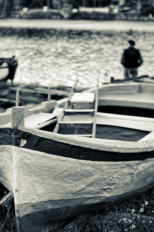 Old man and boat Photograph by Silvia Ganora