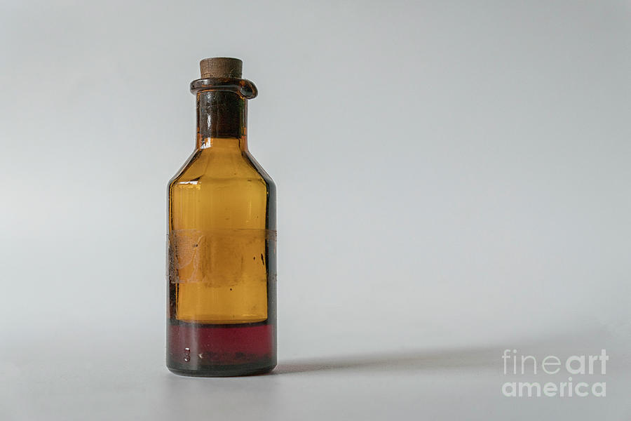 Old medicine bottle Photograph by Patricia Hofmeester