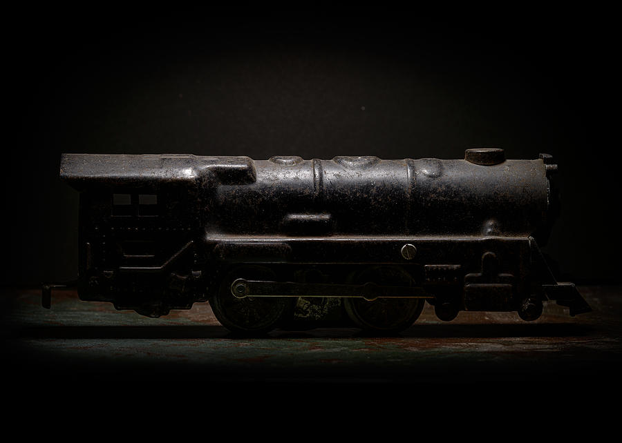 Toy Train Photograph - Old Metal Toy Locomotive by Art Whitton