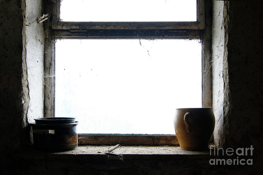 Old pots and stoneware jar on window Photograph by Michal Boubin