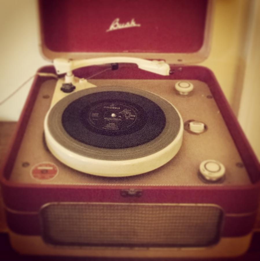 Old record player Photograph by Seeables Visual Arts
