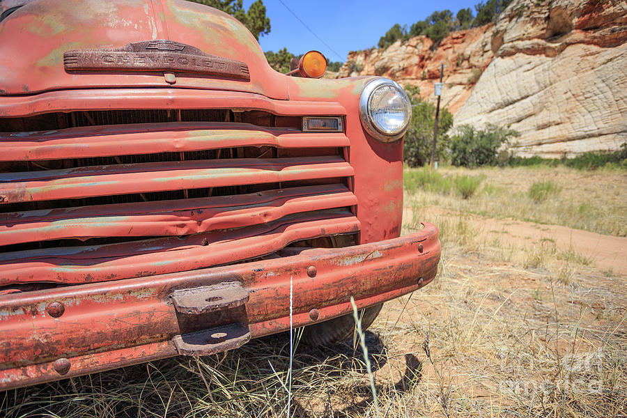 Old red Chevrolet Outside Zion National Park Utah Photograph by Edward Fielding