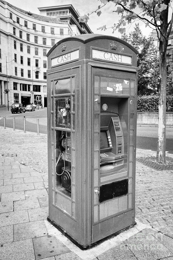 City Photograph - old red telephone box converted into a phone box and atm cash machine Birmingham UK by Joe Fox