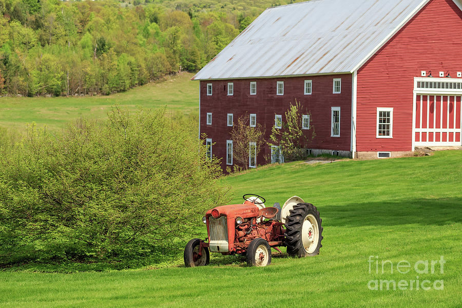 Old Red Vintage Ford Tractor on a farm in Enfield NH Photograph by Edward Fielding