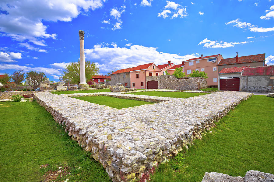 Old roman ruins and colorful architecture in town of Nin Photograph by Brch Photography