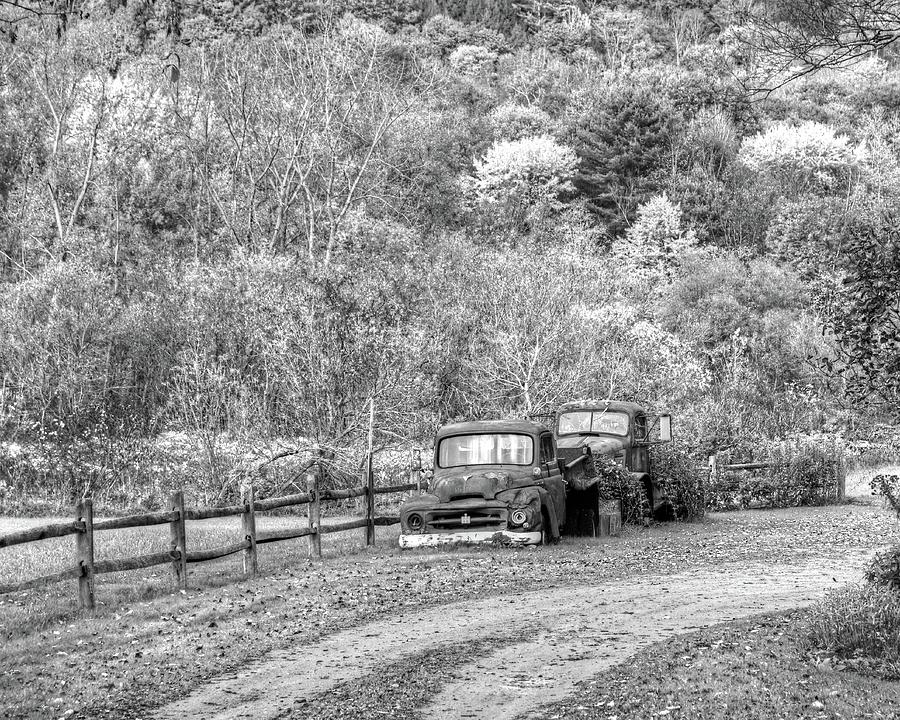 Old Rusted Trucks Bethel Vermont VT New England Foliage Autumn Trees Black and White Photograph by Toby McGuire