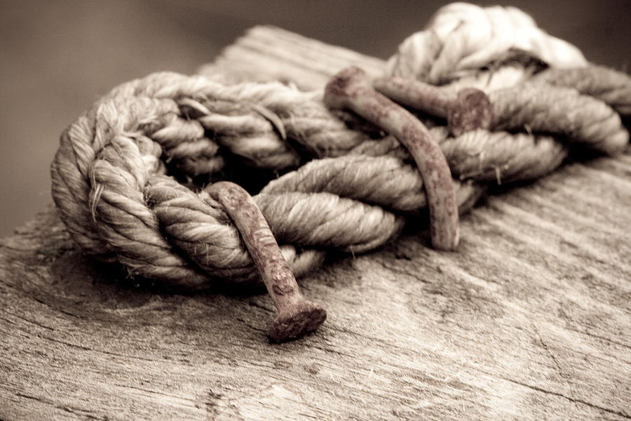 Old Rusty Nails Holding Rope Photograph by Joseph Skalny Old Rusty Nails Holding Rope Photograph by Joseph Skalny