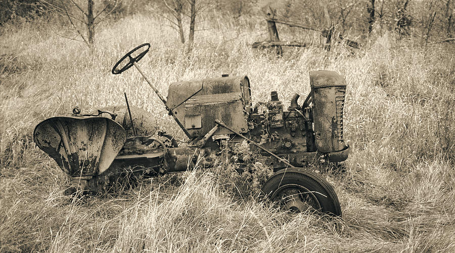 Old rusty tractor Photograph by Peter V Quenter