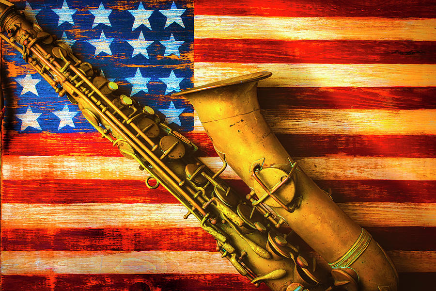 Old Saxophone On Wooden Flag Photograph by Garry Gay