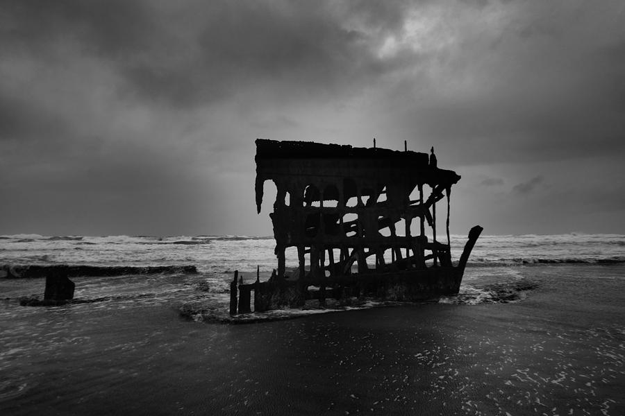 Old shipwreck off the Oregon coast BandW Photograph by Jeff Swan