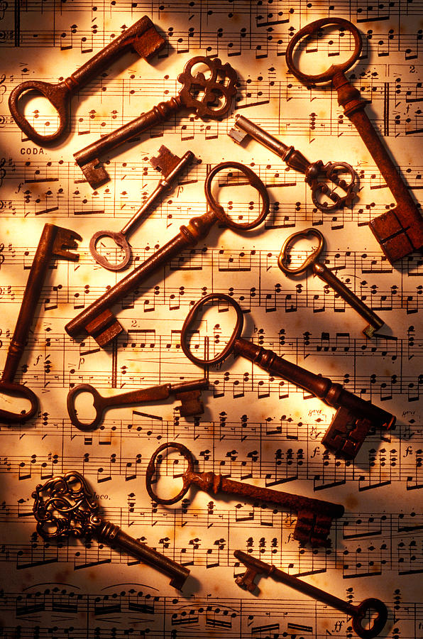 Music Photograph - Old skeleton keys on sheet music by Garry Gay