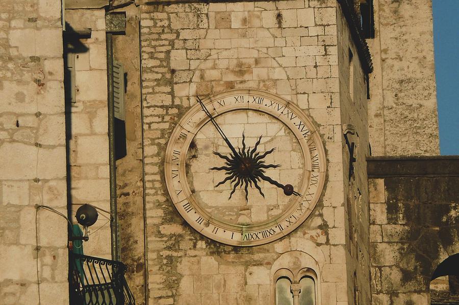 Clock Photograph - Old Stone Wall Clock by Olga Kurygina Clock Photograph - Old Stone Wall Clock by Olga Kurygina