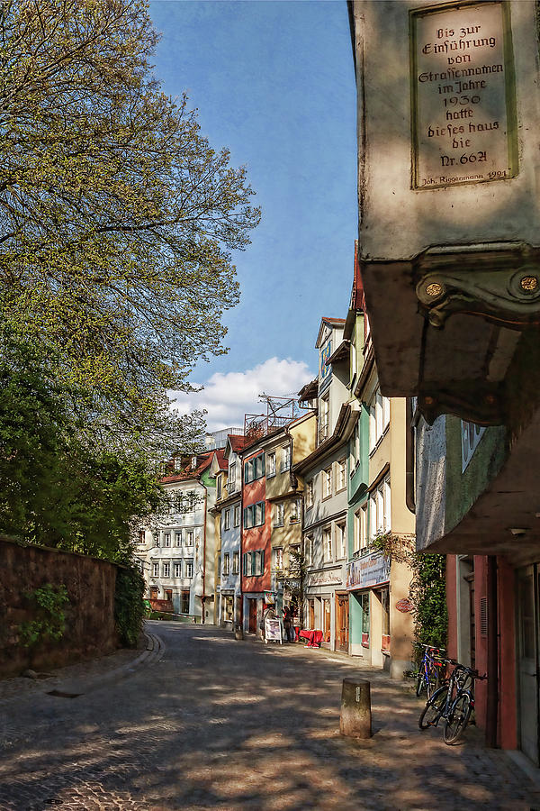 Old street in Lindau, Germany Photograph by Tatiana Travelways