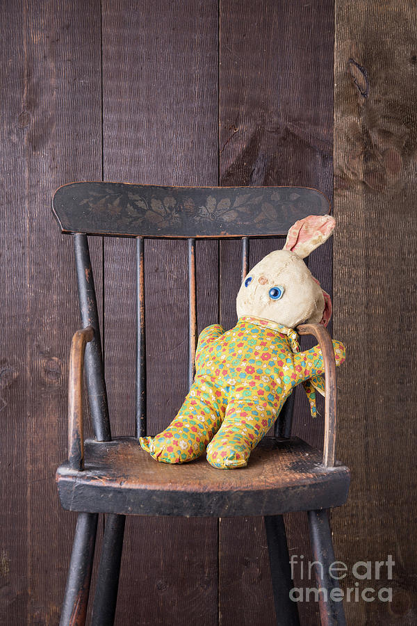 Old Stuffed Bunny on High Chair Photograph by Edward Fielding
