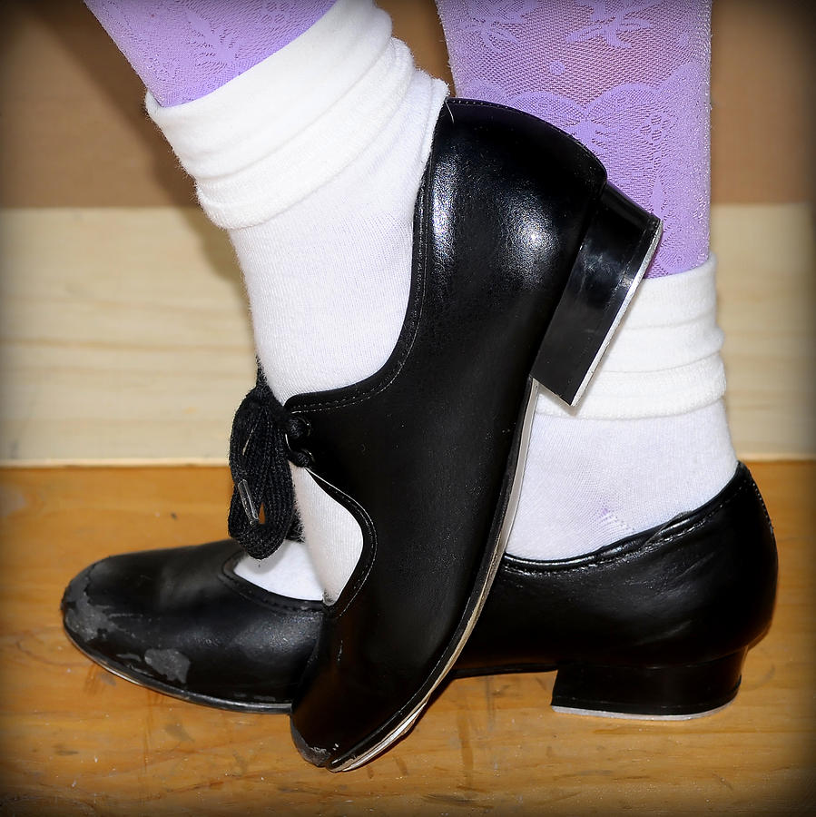 Old Tap Dance Shoes With White Socks And Wooden Floor