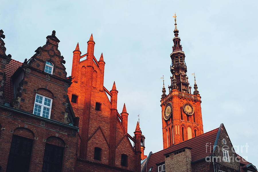 Old Town buildings in Gdansk during sunrise. Photograph by Michal Bednarek