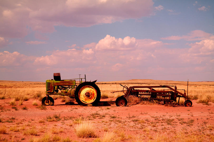 Old tractor and rake Photograph by Jeff Swan
