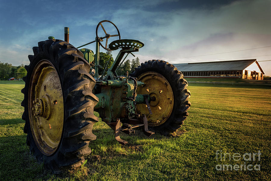 Old tractor in the field Outside of Keene NH Photograph by Edward Fielding