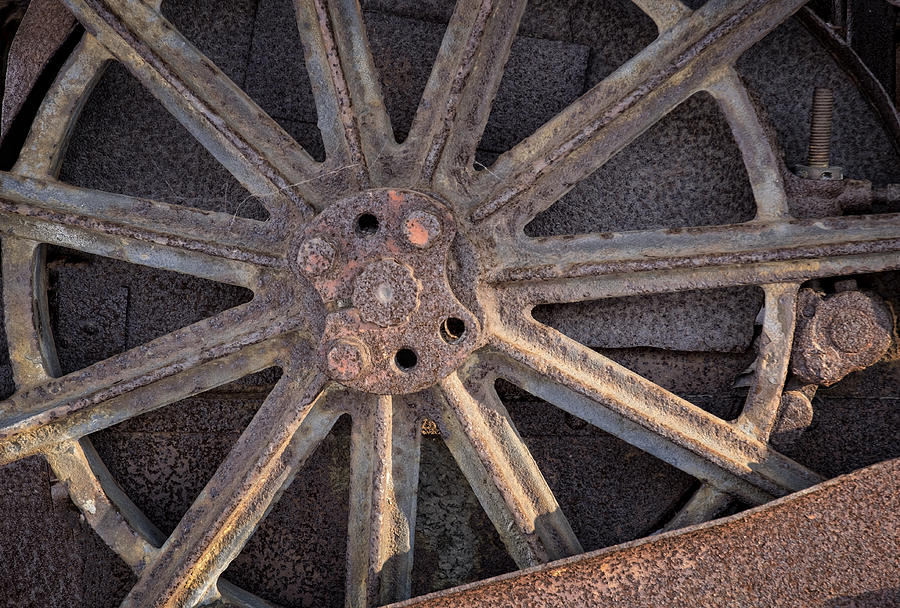 Old Tractor Wheel Photograph by Tom Singleton