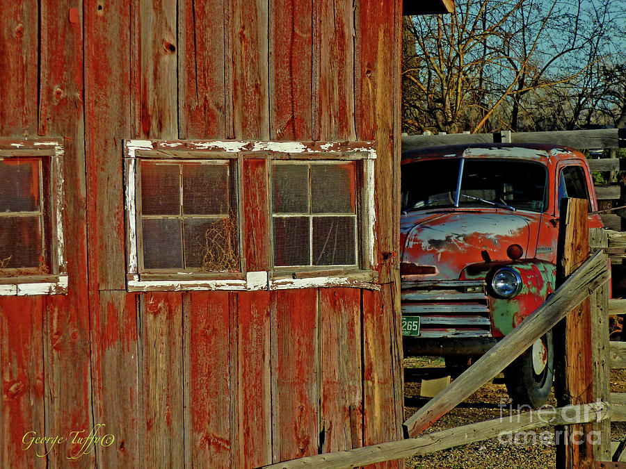 Old truck and barn Photograph by George Tuffy
