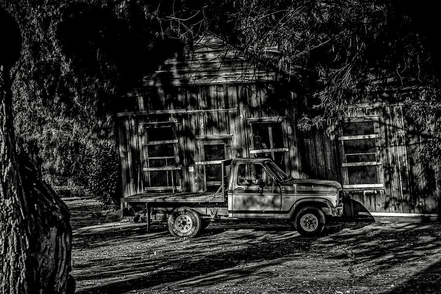 Old Truck with Old building Photograph by Bruce Bottomley