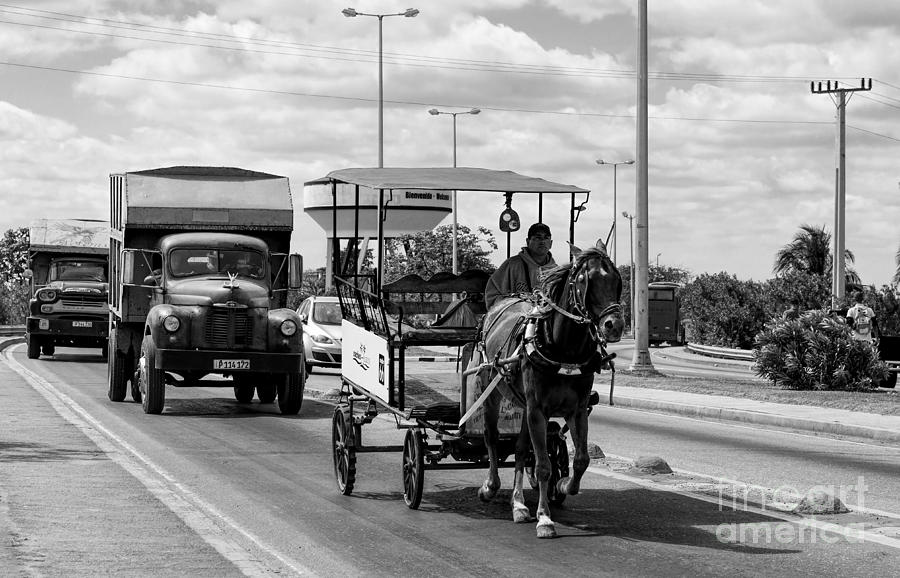 Car Photograph - Old trucks and a horse carriage by Les Palenik
