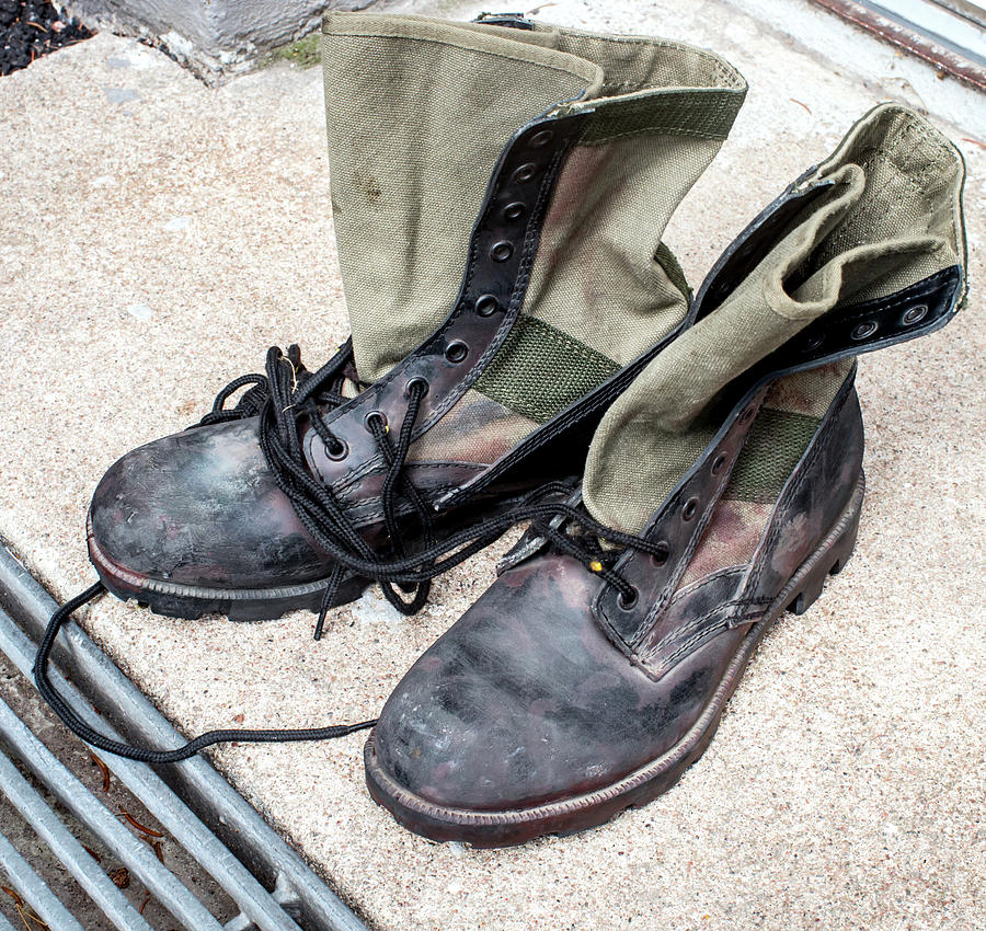 old used jungle boots from Vietnam war period Photograph by Jarmo Honkanen