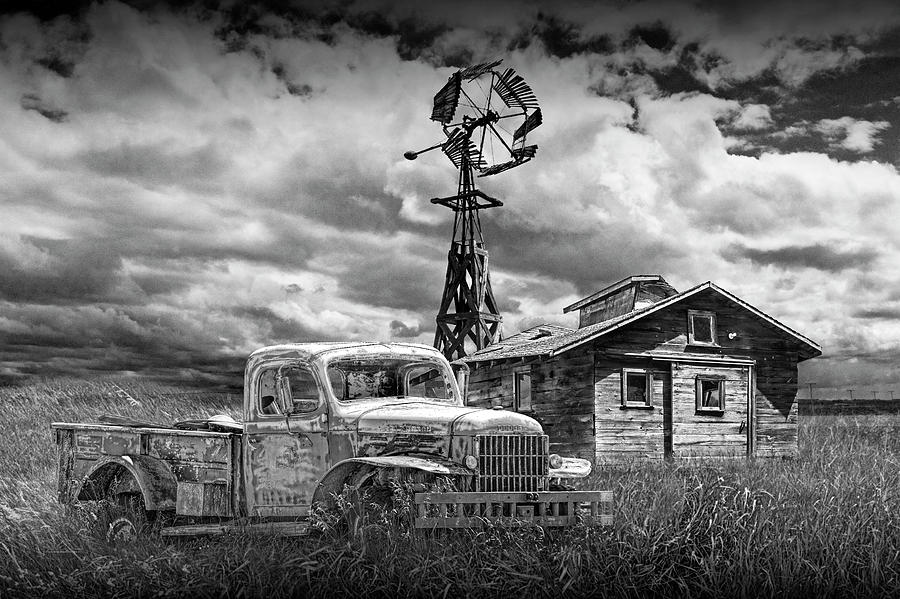 Old Vintage Junk Dodge Pickup in Black and White with Decaying Barn Photograph by Randall Nyhof