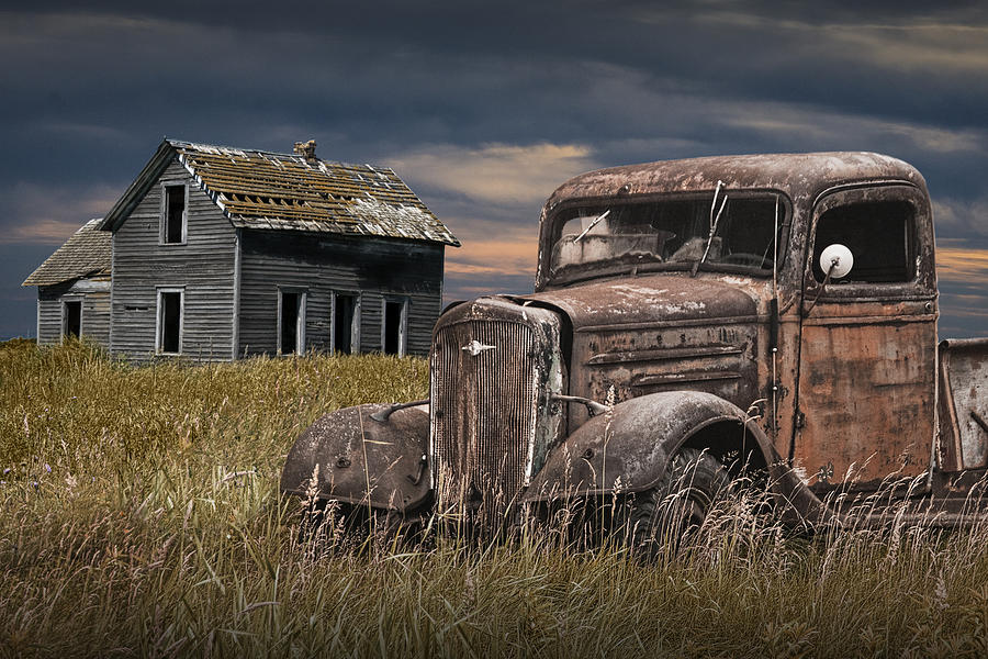 Old Vintage Pickup by an Abandoned Farm House on the Prairie Photograph by Randall Nyhof