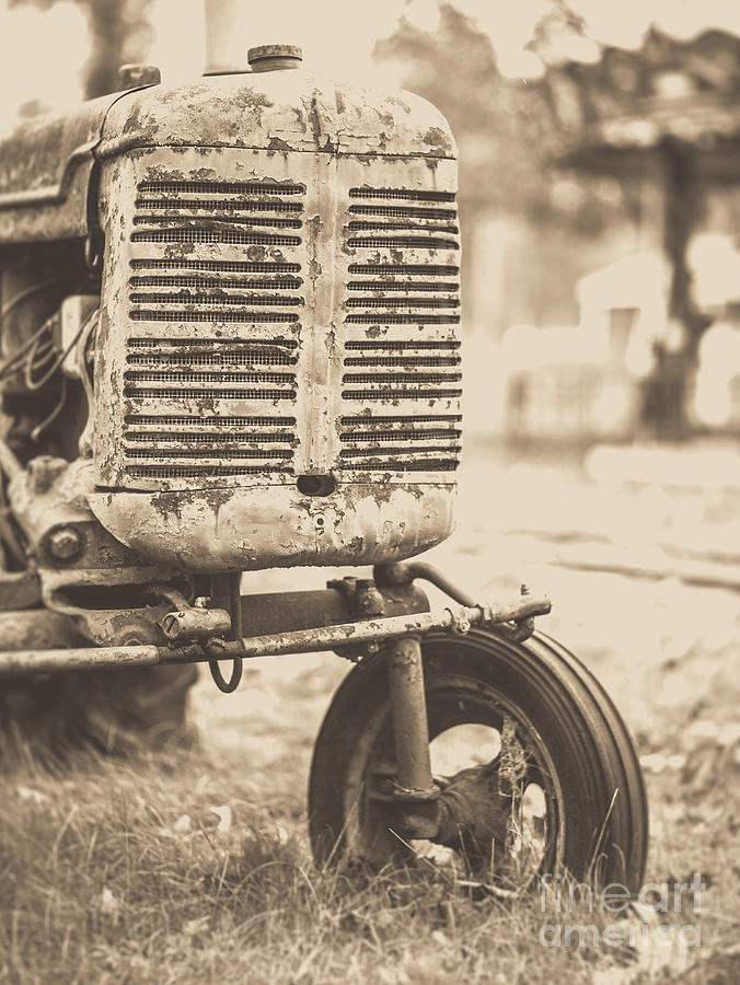 Old Vintage Tractor Brown Toned Photograph by Edward Fielding