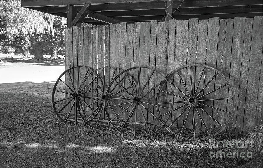 Old Wagon Wheels Black And White Photograph by Kathy Baccari