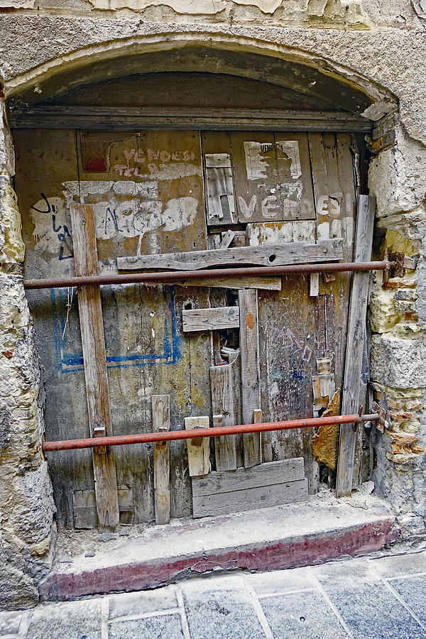 Old Weathered Archway Door In Cagliari Sardinia Photograph by Rick Rosenshein