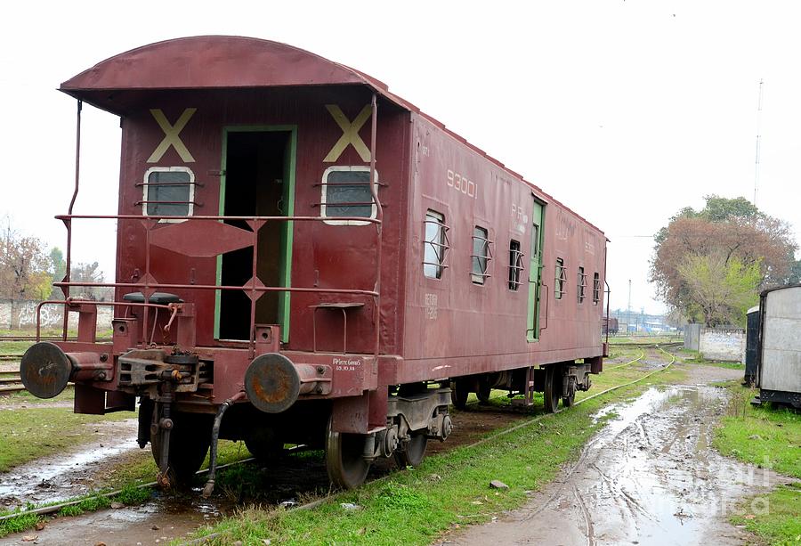 Old weathered Pakistan Railways brake van at Peshawar junction siding Photograph by Imran Ahmed