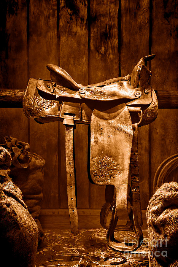 Old Western Saddle - Sepia Photograph by Olivier Le Queinec