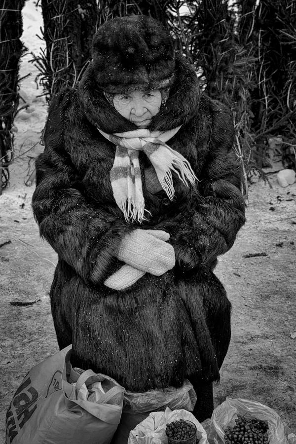 Old Woman in Fur Selling Berries in Winter Photograph by John Williams