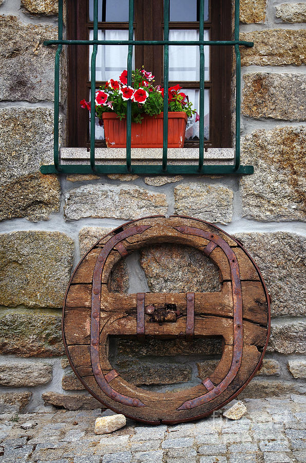 Architecture Photograph - Old Wooden Wheel by Carlos Caetano