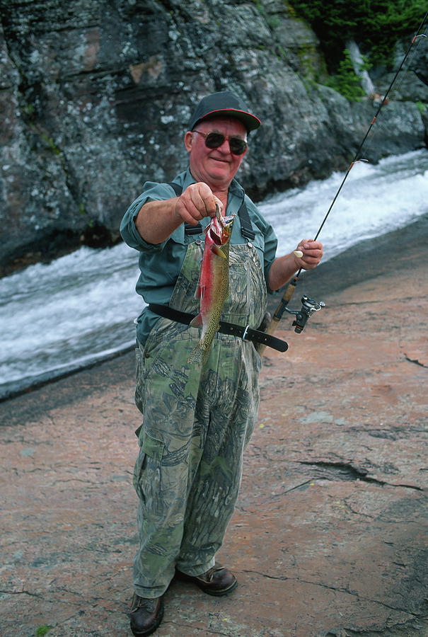 Older Man Holding A Nice Trout He Just Caught Photograph