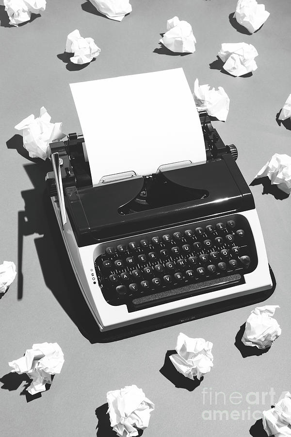 Oldschool typewriter and creased paper. Photograph by Michal Bednarek