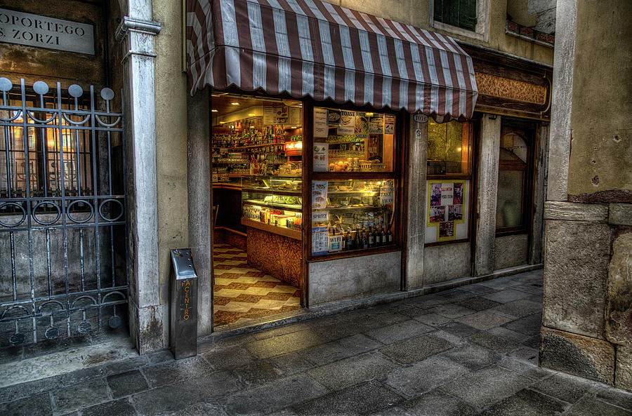 On a street corner in Venice Photograph by John Hoey