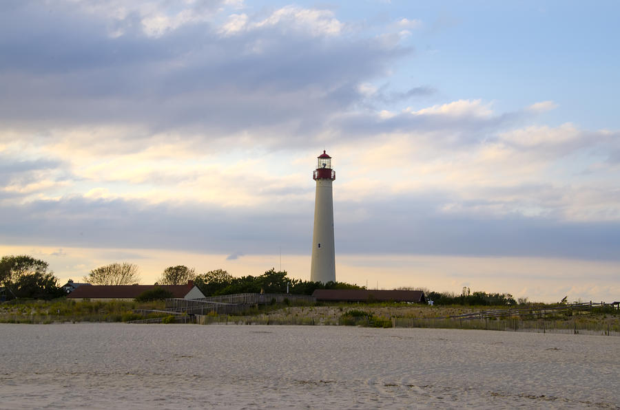 Beach Photograph - On the Beach at Cape May Lighthouse by Bill Cannon