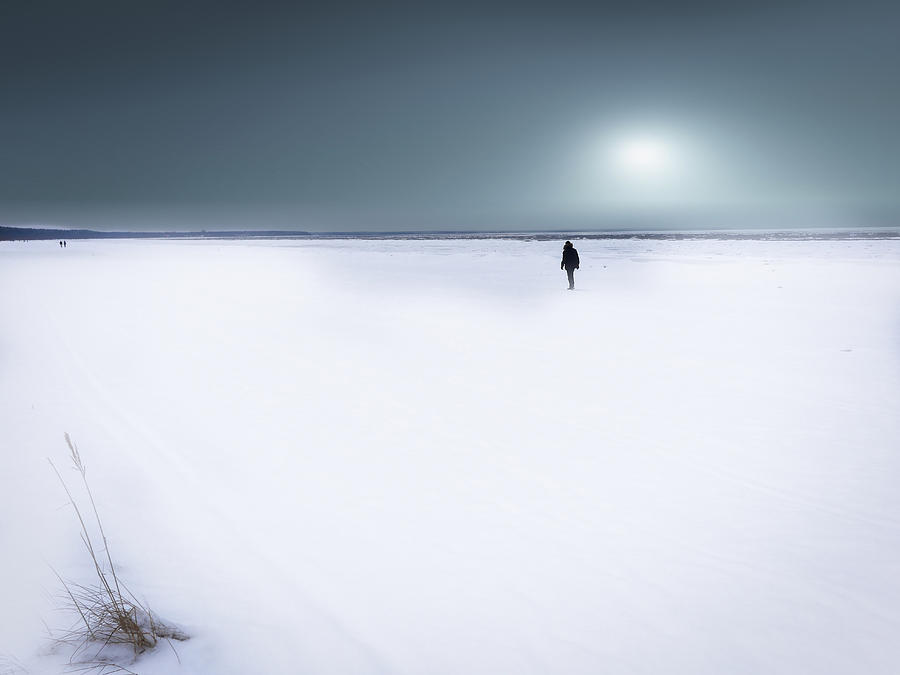 Solitude on the beach  Photograph by Aleksandrs Drozdovs