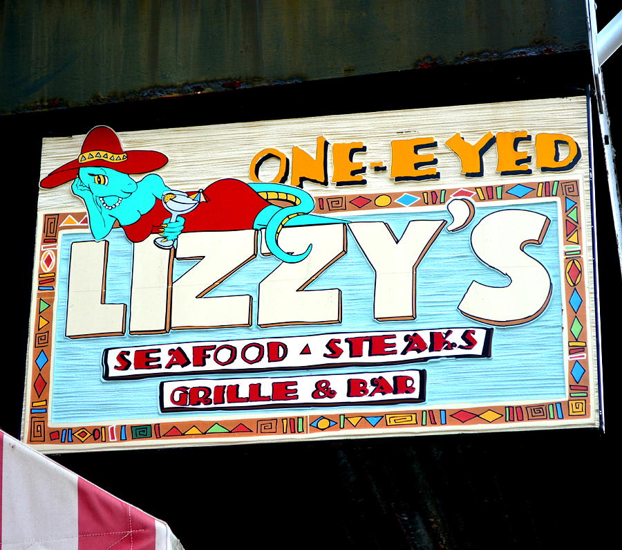 Sign Photograph - One Eyed Lizzys by Linda Covino