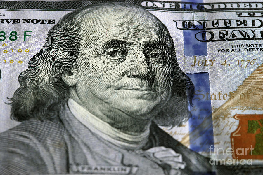 One hundred dollar.Focus on Benjamin Franklin Photograph by Michal Bednarek